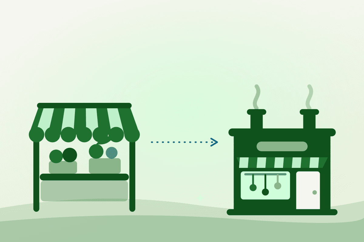 Flat illustration of a market stall connected by a dotted arrow to a commercial kitchen building