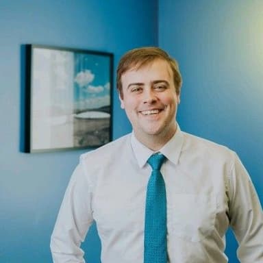 Professional Headshot of Andrew Byrne, Food Web's CMO